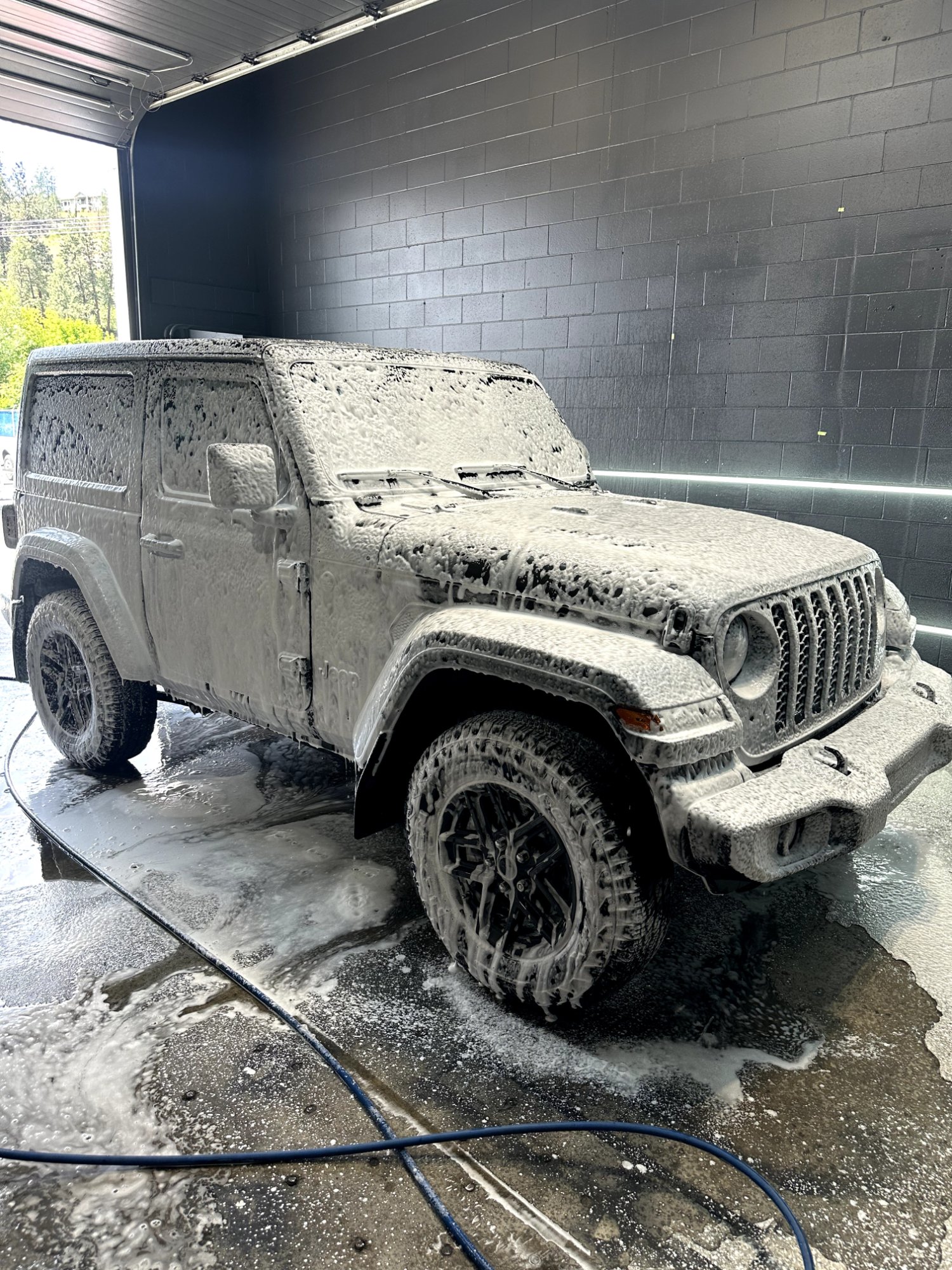 Jeep being foam-washed after an Icon Rocklear coating, Kelowna